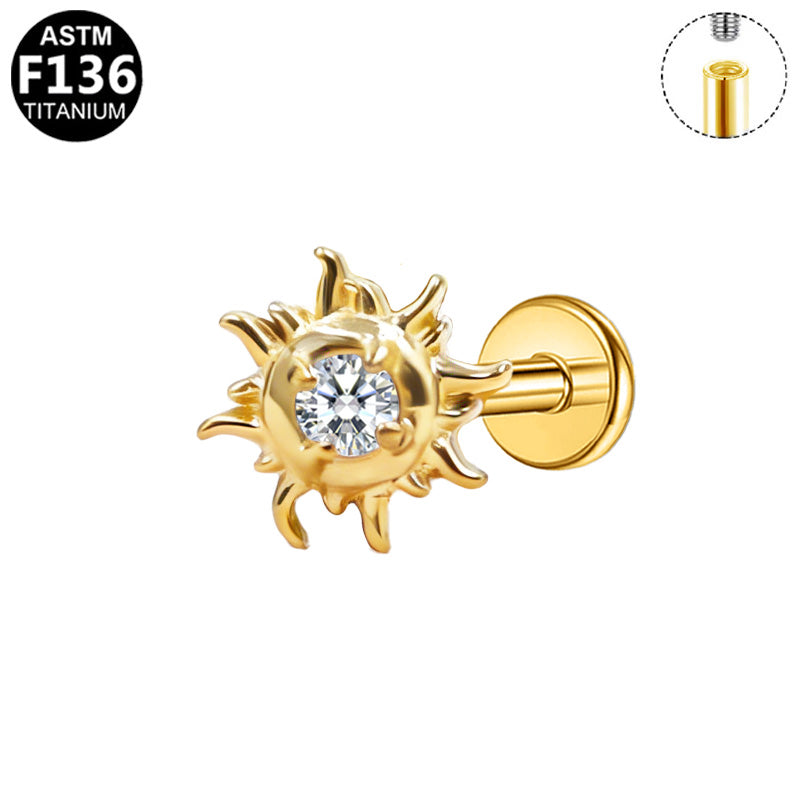 Piercing soleil strass en titane doré
