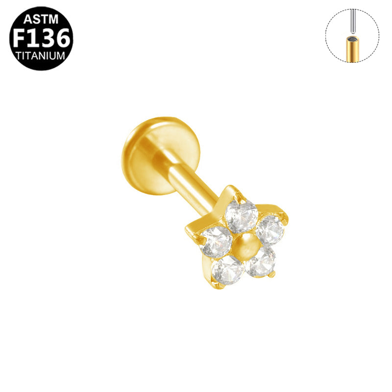 Piercing fleur cinq pétales en titane doré
