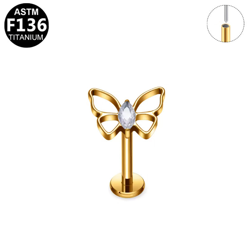Piercing papillon ajouré en titane doré