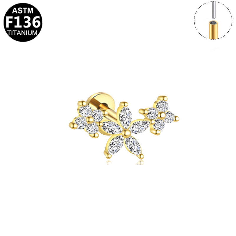 Piercing trio de fleurs en titane doré