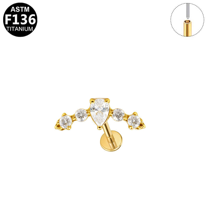 Piercing arc et goutte zircons en titane doré
