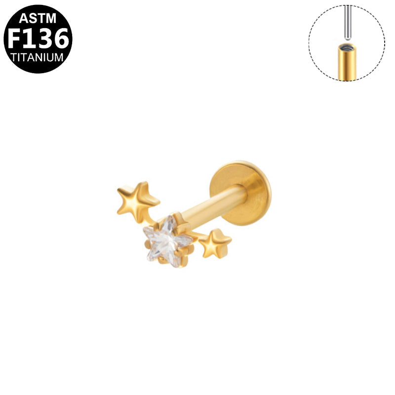 Piercing trio d'étoiles en titane doré