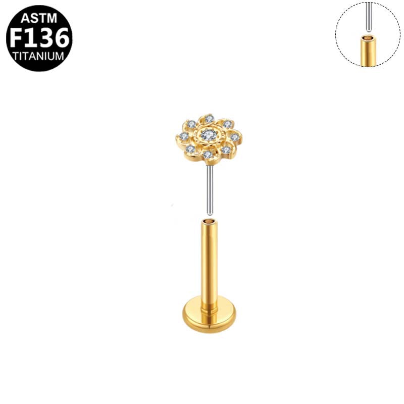 Piercing petite fleur zircons en titane doré