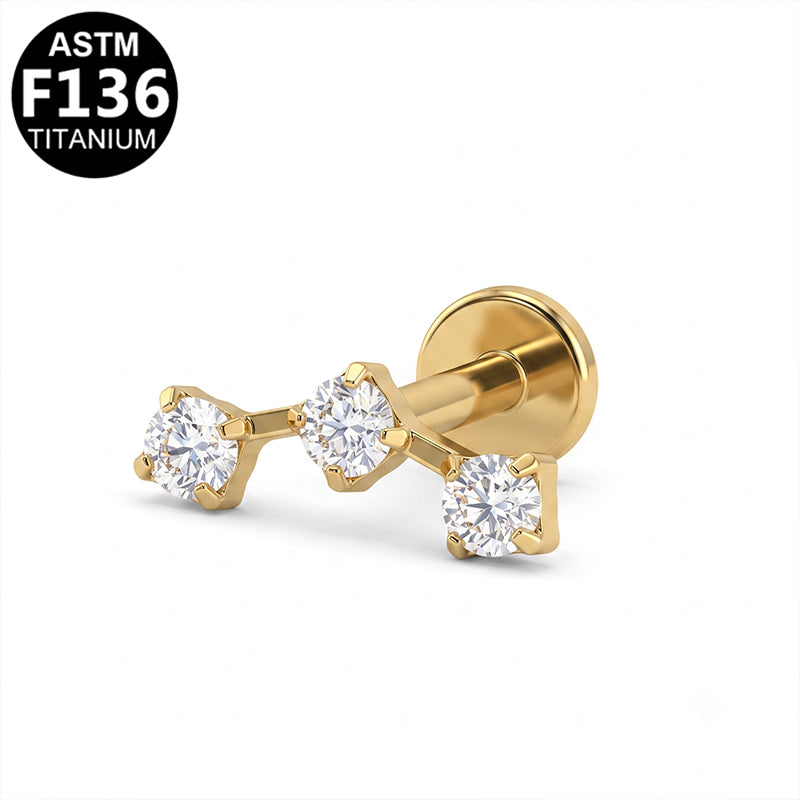 Piercing trio de zircons alignés en titane doré