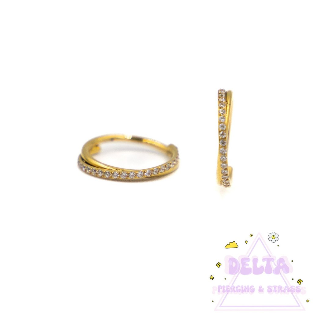 Anneau doré en titane croisé avec strass