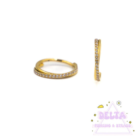 Anneau doré en titane croisé avec strass